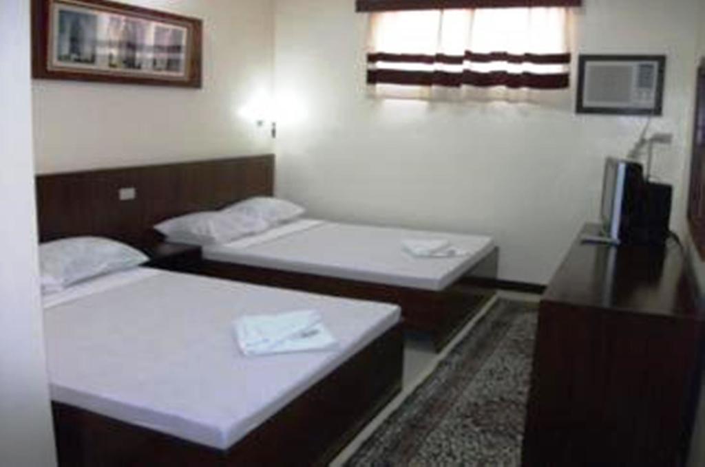 Ysabelle Mansion Bed & Breakfast Puerto Princesa Oda fotoğraf