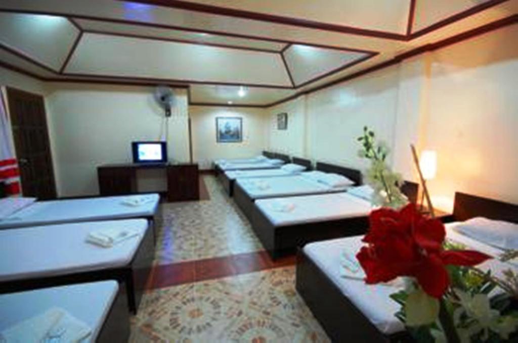 Ysabelle Mansion Bed & Breakfast Puerto Princesa Oda fotoğraf