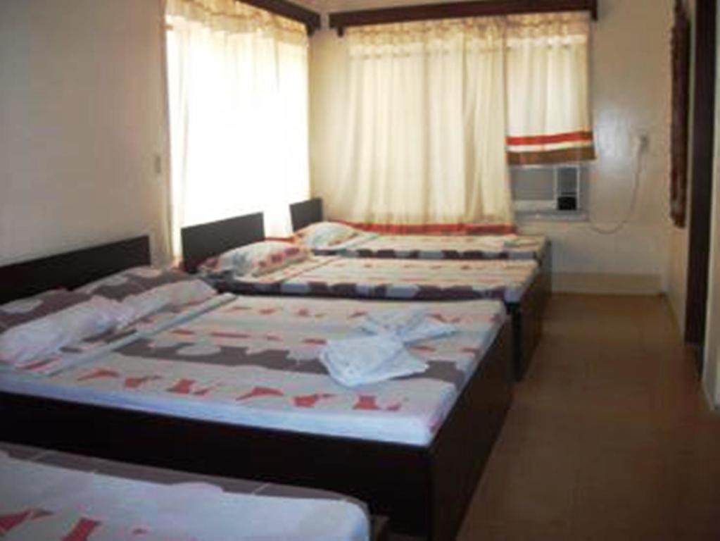 Ysabelle Mansion Bed & Breakfast Puerto Princesa Oda fotoğraf